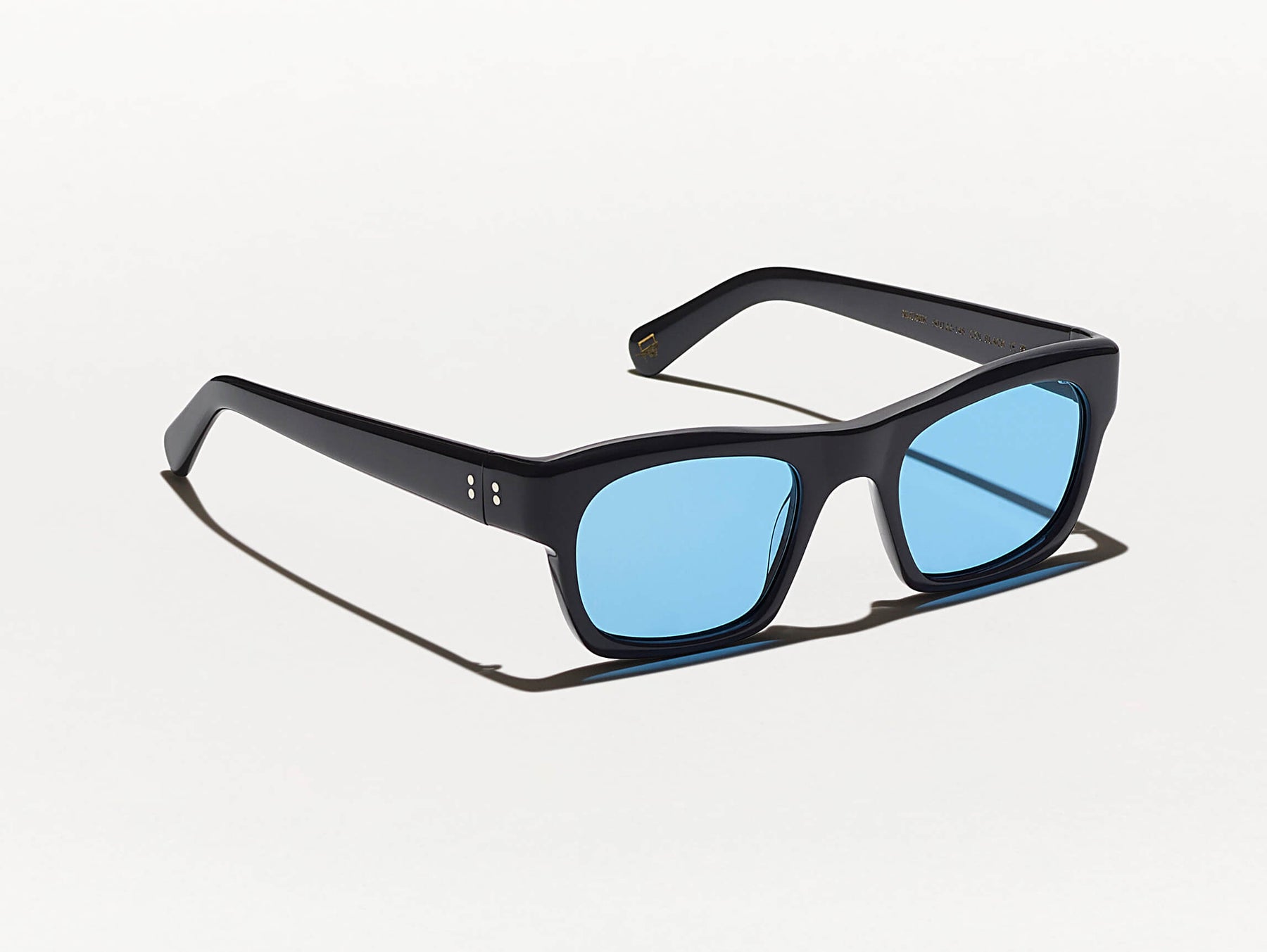 The NUDNIK SUN in Black with Celebrity Blue Tinted Lenses
