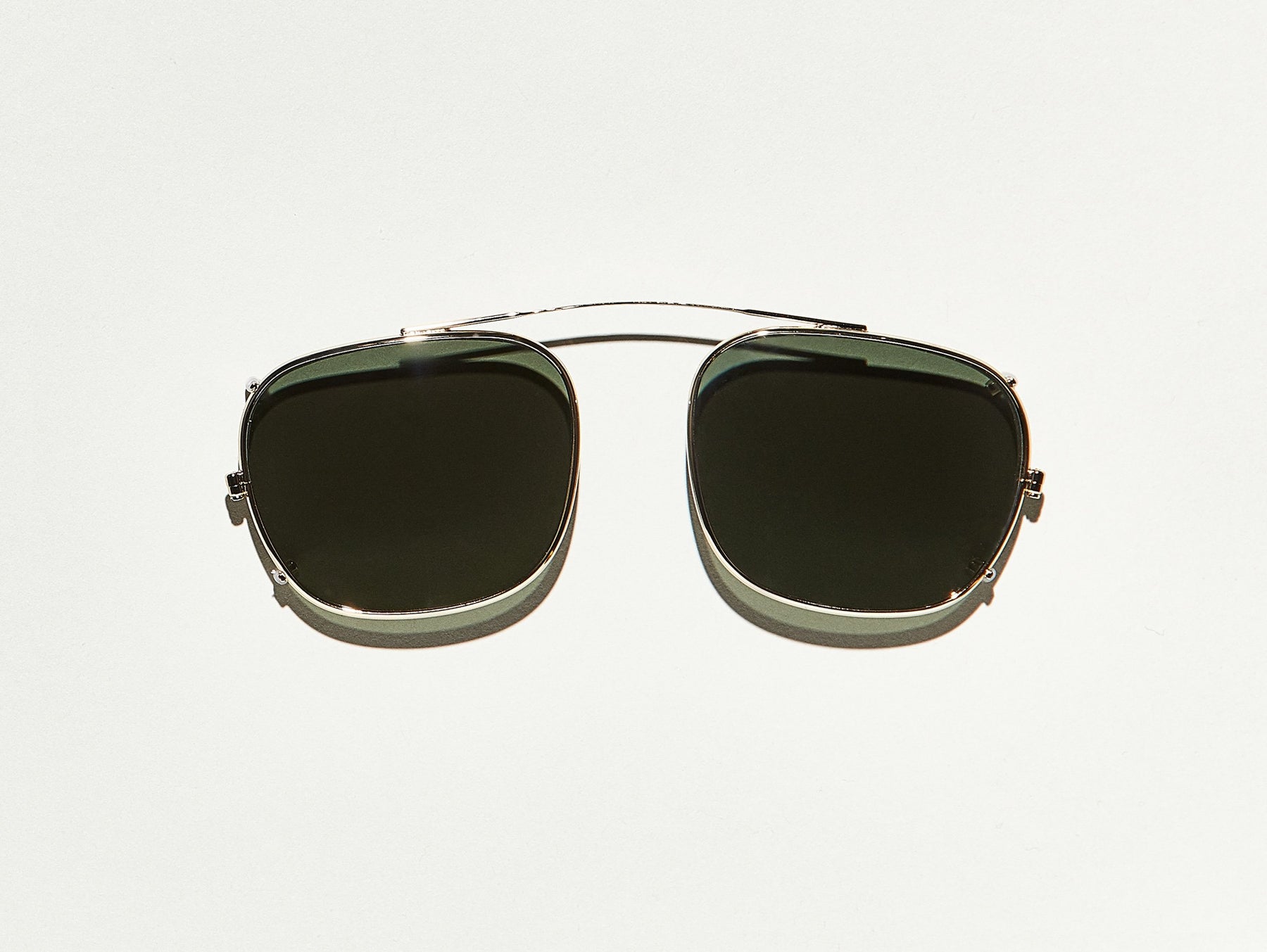 The SCHLEP CLIP in Gold with G-15 Lenses