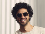 Model is wearing The SCHLEP CLIP in Gunmetal in size 50 with G-15 Lenses