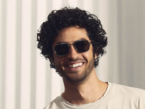 Model is wearing The SCHLEP CLIP in Gunmetal in size 50 with G-15 Lenses