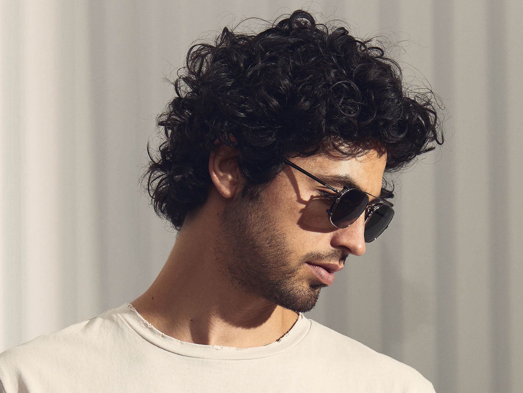 Model is wearing The SCHLEP CLIP in Gunmetal in size 50 with G-15 Lenses