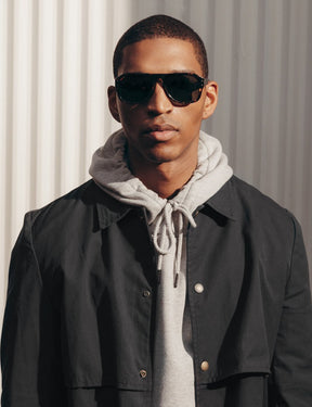 Model is wearing The SECHEL SUN in Dark Havana in size 54 with G-15 Glass Lenses