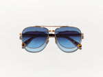 The SHAV SUN in Gold with Denim Blue Tinted Lenses