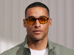 Model is wearing The SHINDIG Black in size 50 with Mellow Yellow Tinted Lenses