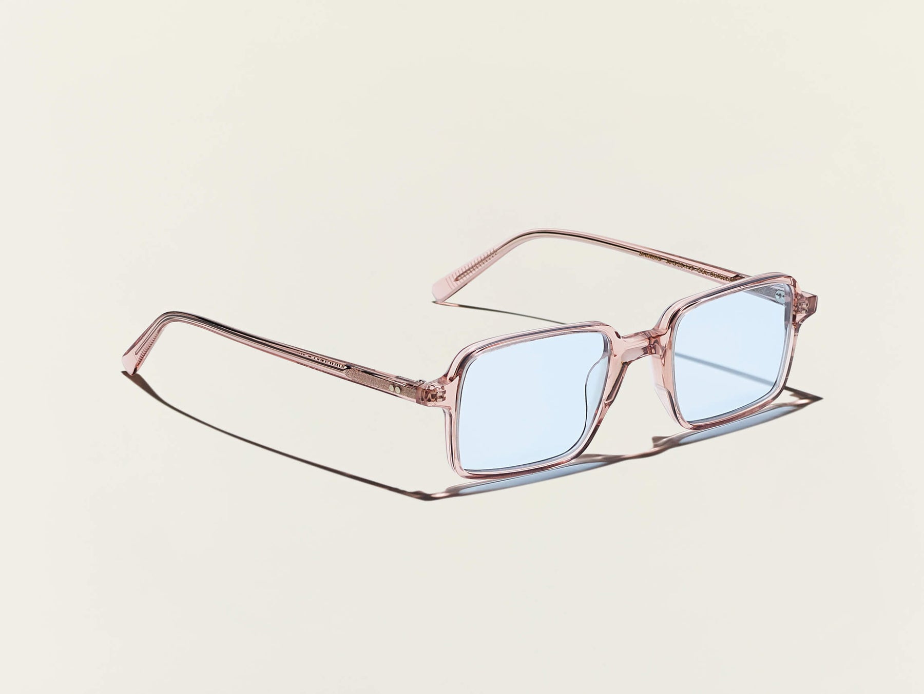 The SHINDIG SUN in Burnt Rose with Bel Air Blue Tinted Lenses