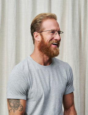 Model is wearing The SIMCHA in size 52 in Dark Gunmetal