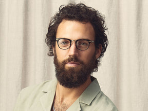 Model is wearing The STEVIE in size 48 in Tortoise/Antique Gold