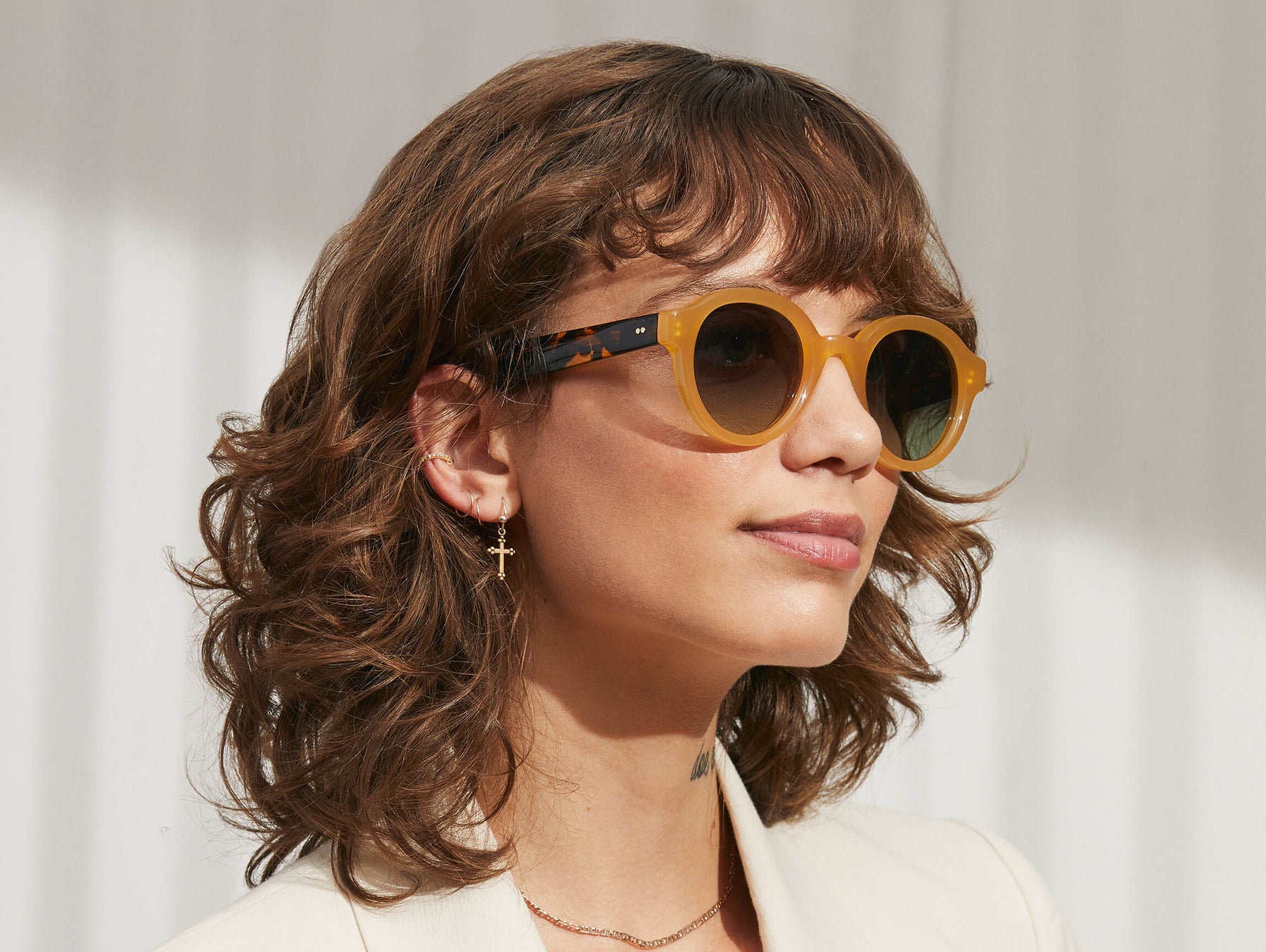 Model is wearing The GREPS SUN in Honey/Tortoise in size 47 with Forest Wood Tinted Lenses