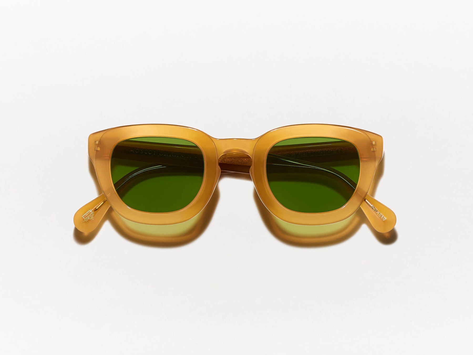 The TELENA SUN in Butterscotch with Calibar Green Glass Lenses