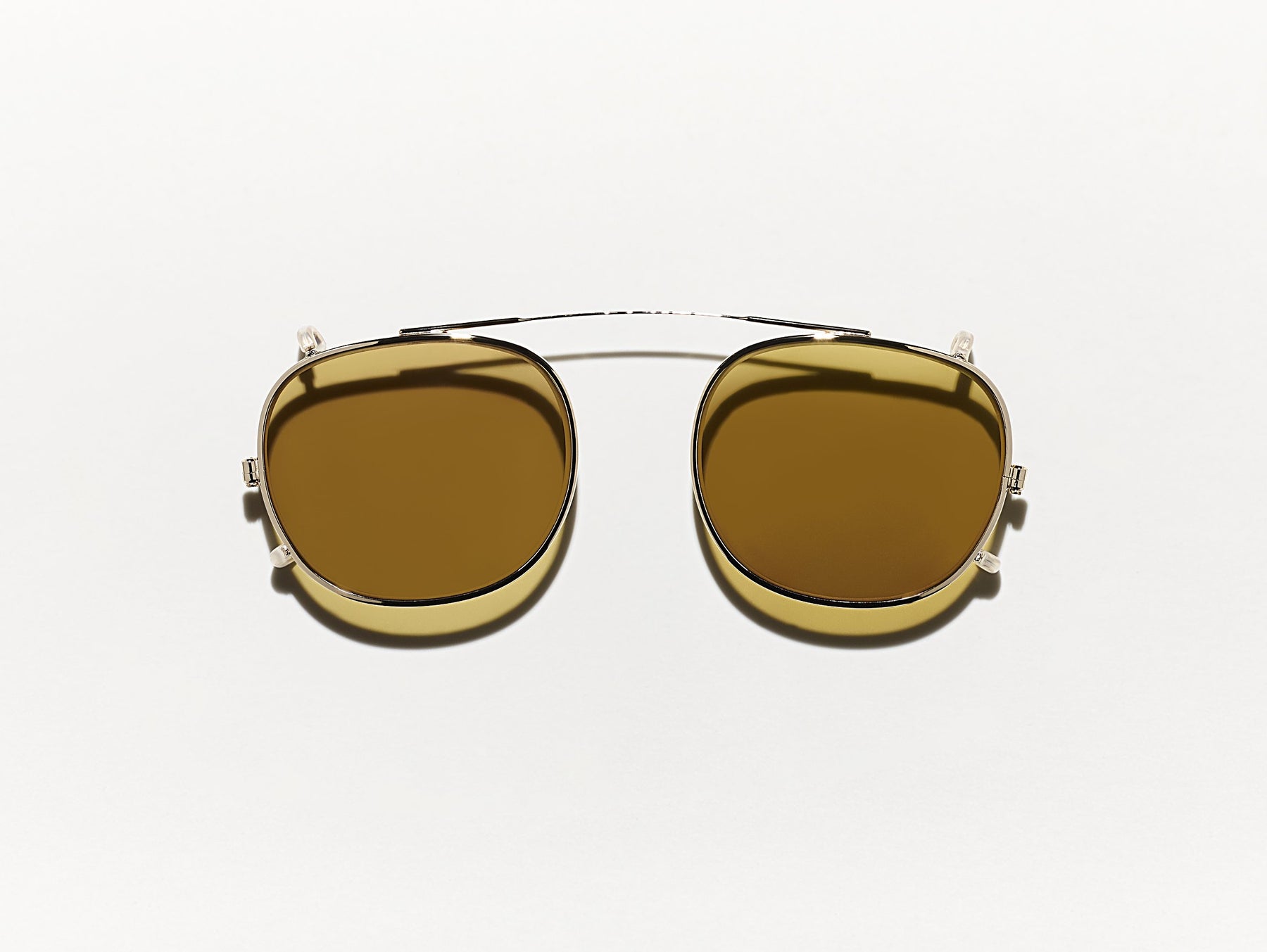 The CLIPTOSH in Gold with Amber Tinted Lenses