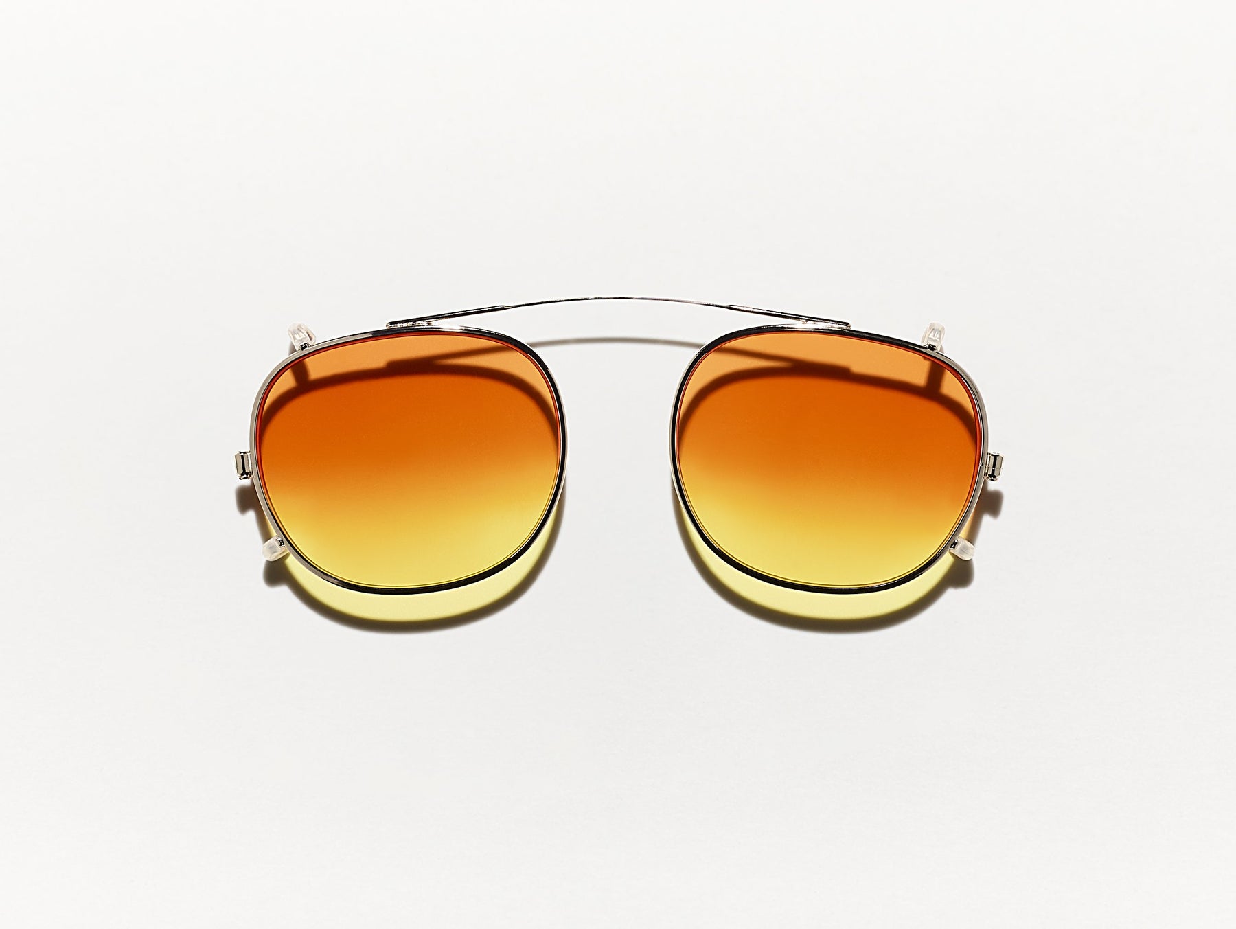 The CLIPTOSH in Gold with Candy Corn Tinted Lenses
