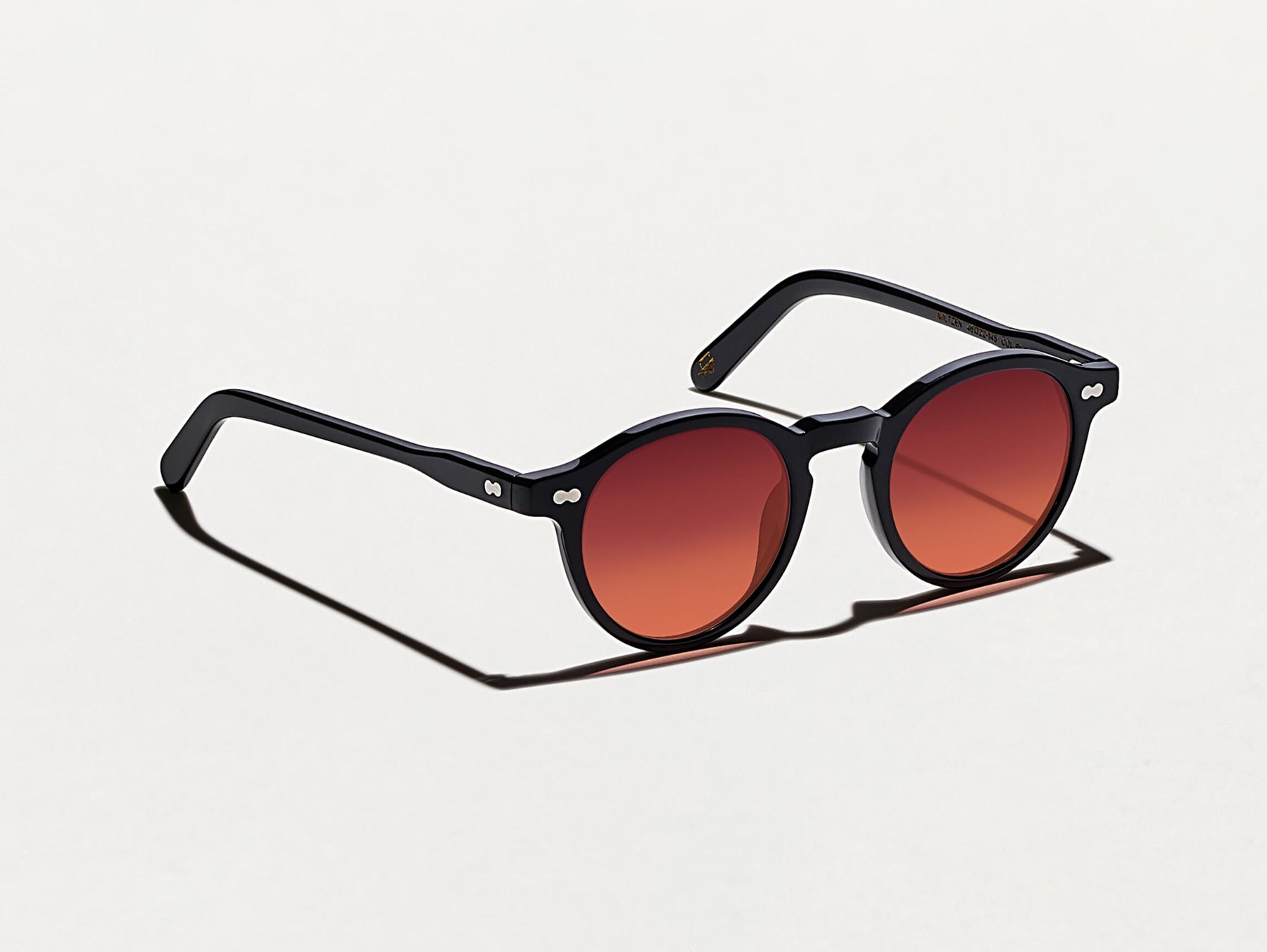 The MILTZEN Black with Cabernet Tinted Lenses