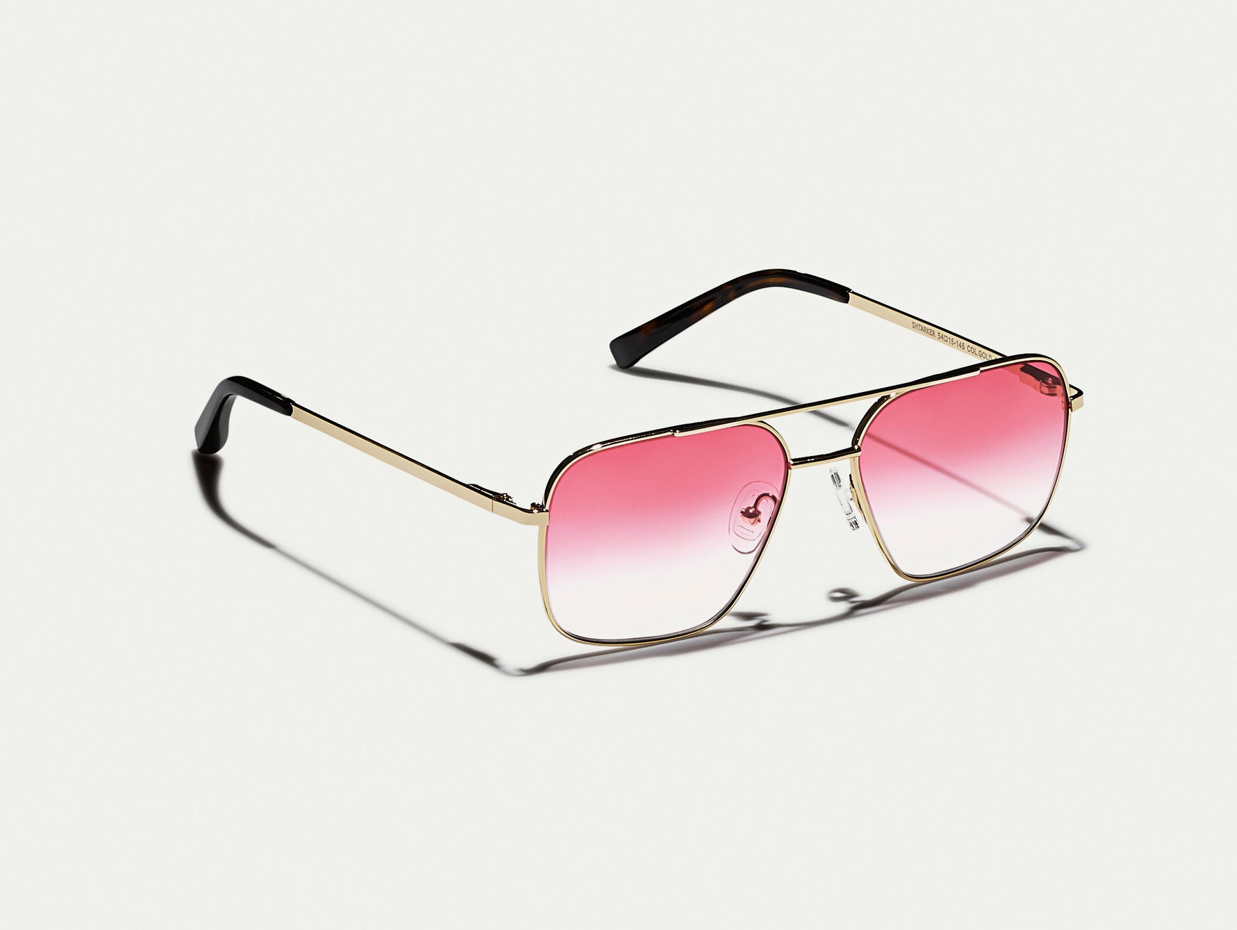 The SHTARKER in Gold with Big Apple Fade Tinted Lenses