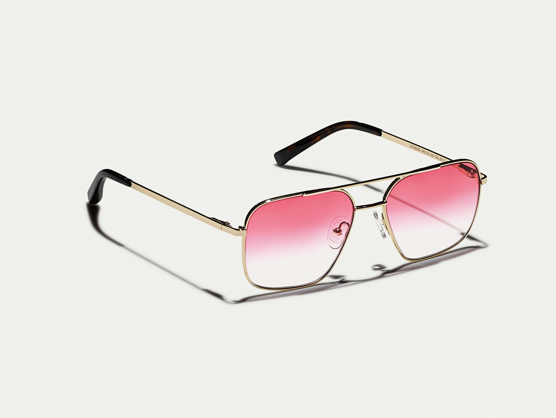 The SHTARKER in Gold with Big Apple Fade Tinted Lenses