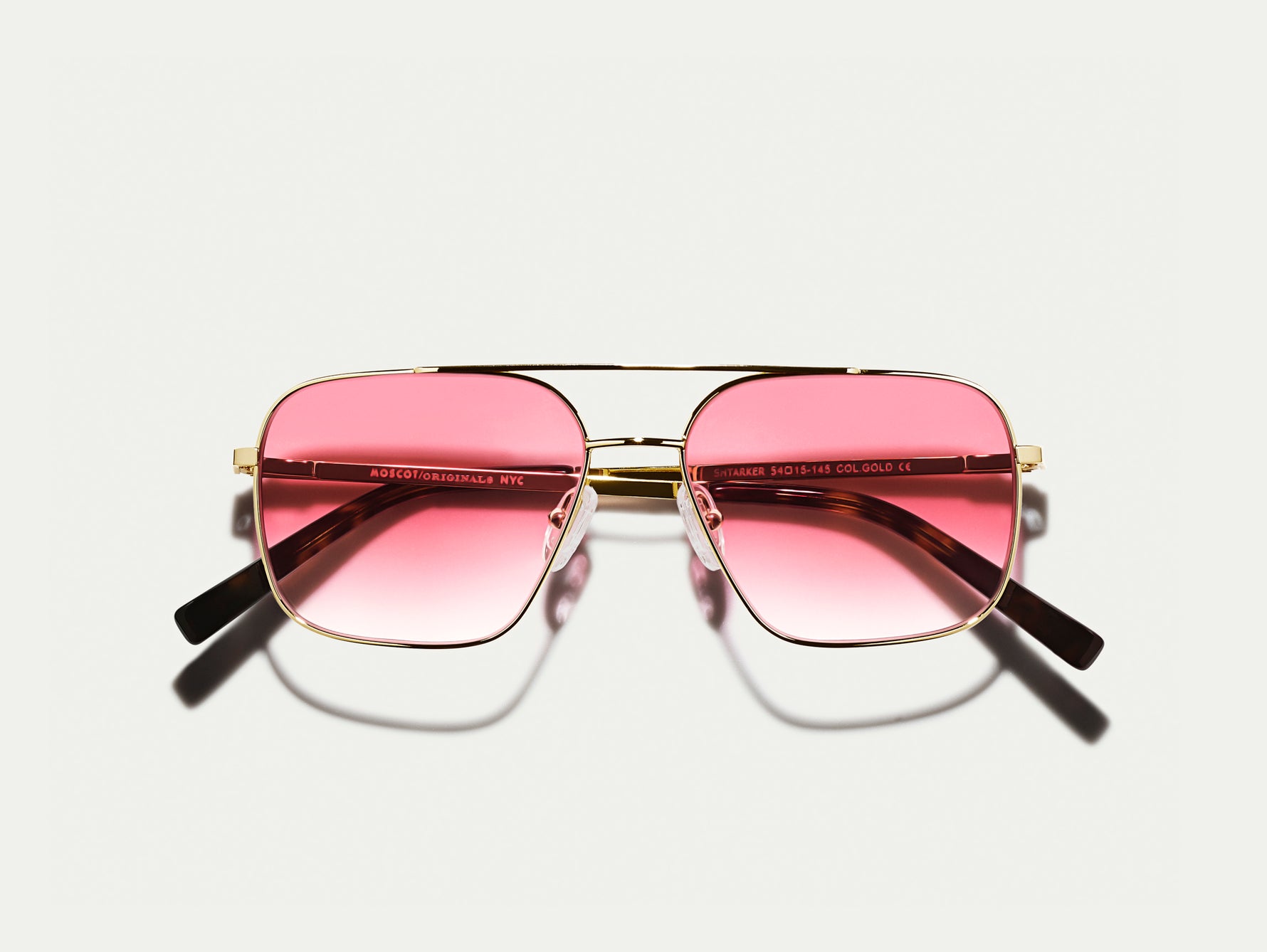 The SHTARKER in Gold with Big Apple Fade Tinted Lenses