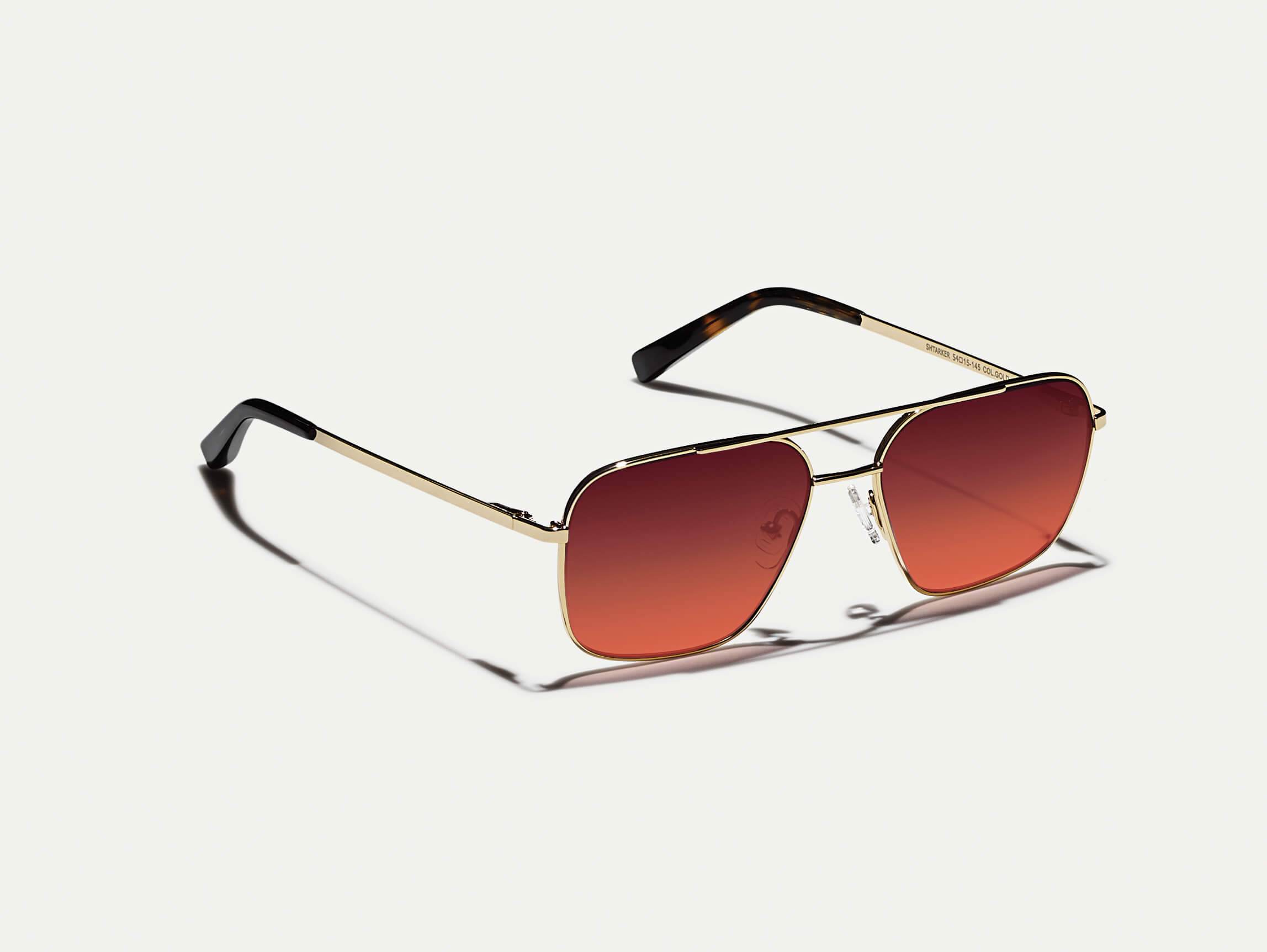 #color_cabernet | The SHTARKER in Gold with Cabernet Tinted Lenses