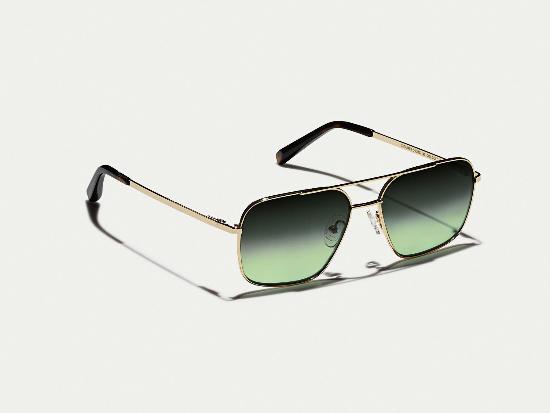 The SHTARKER in Gold with Forest Wood Tinted Lenses