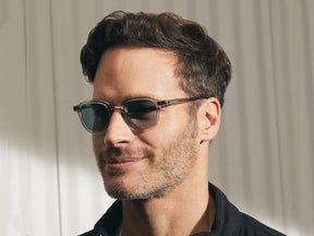 Model is wearing The VANTZ SUN in Light Grey in size 47 with DG-37 Glass Lenses