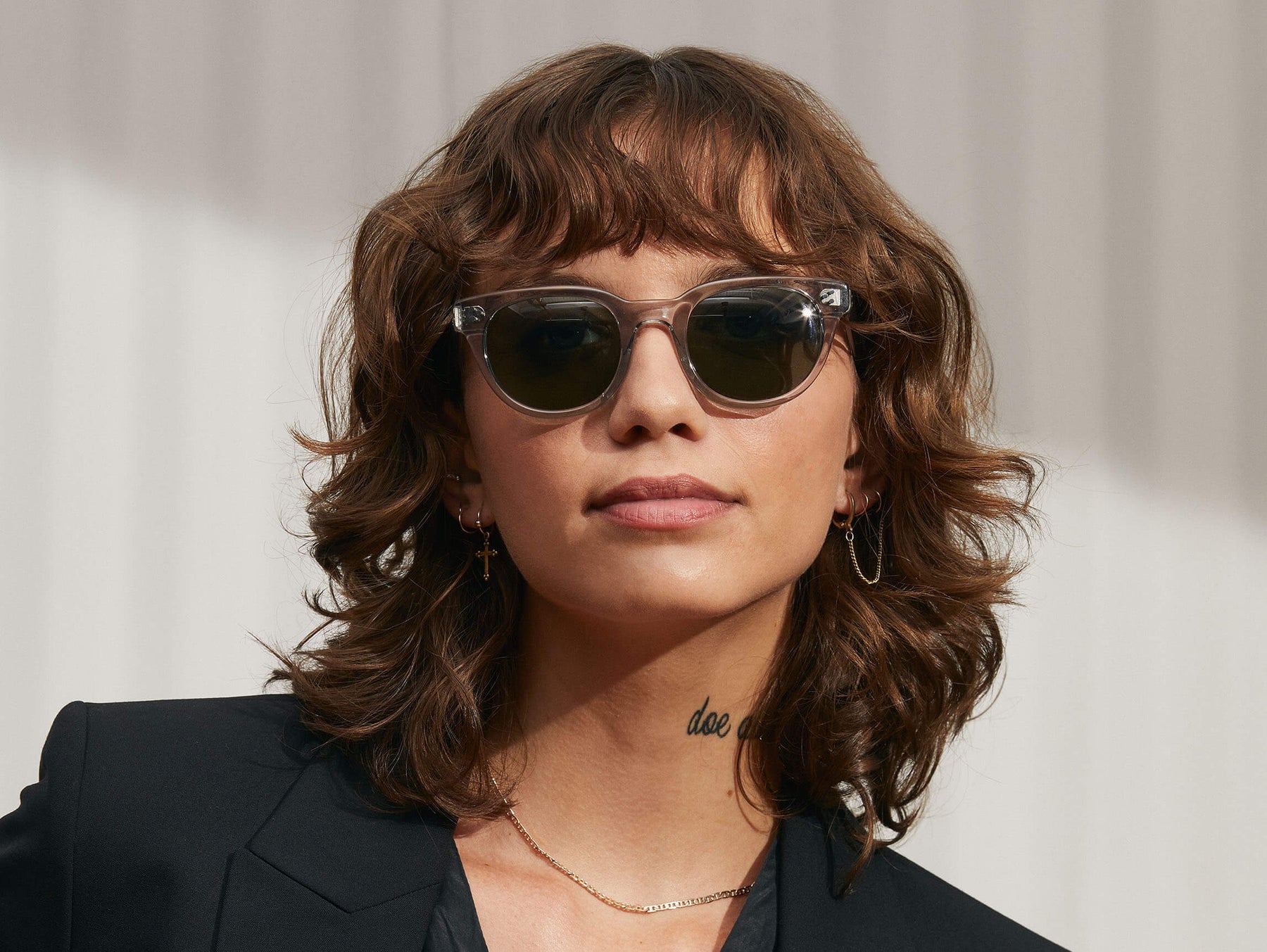 Model is wearing The VILDA SUN in Light Grey in size 48 with G-15 Glass Lenses