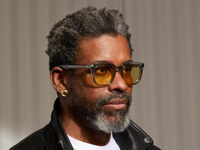 Model is wearing The YONTIF in Sage in size 52 with Pastel Yellow Tinted Lenses