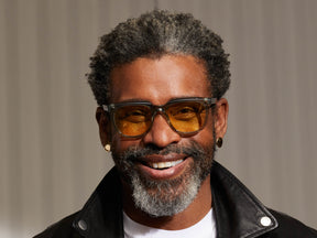 Model is wearing The YONTIF in Sage in size 52 with Pastel Yellow Tinted Lenses