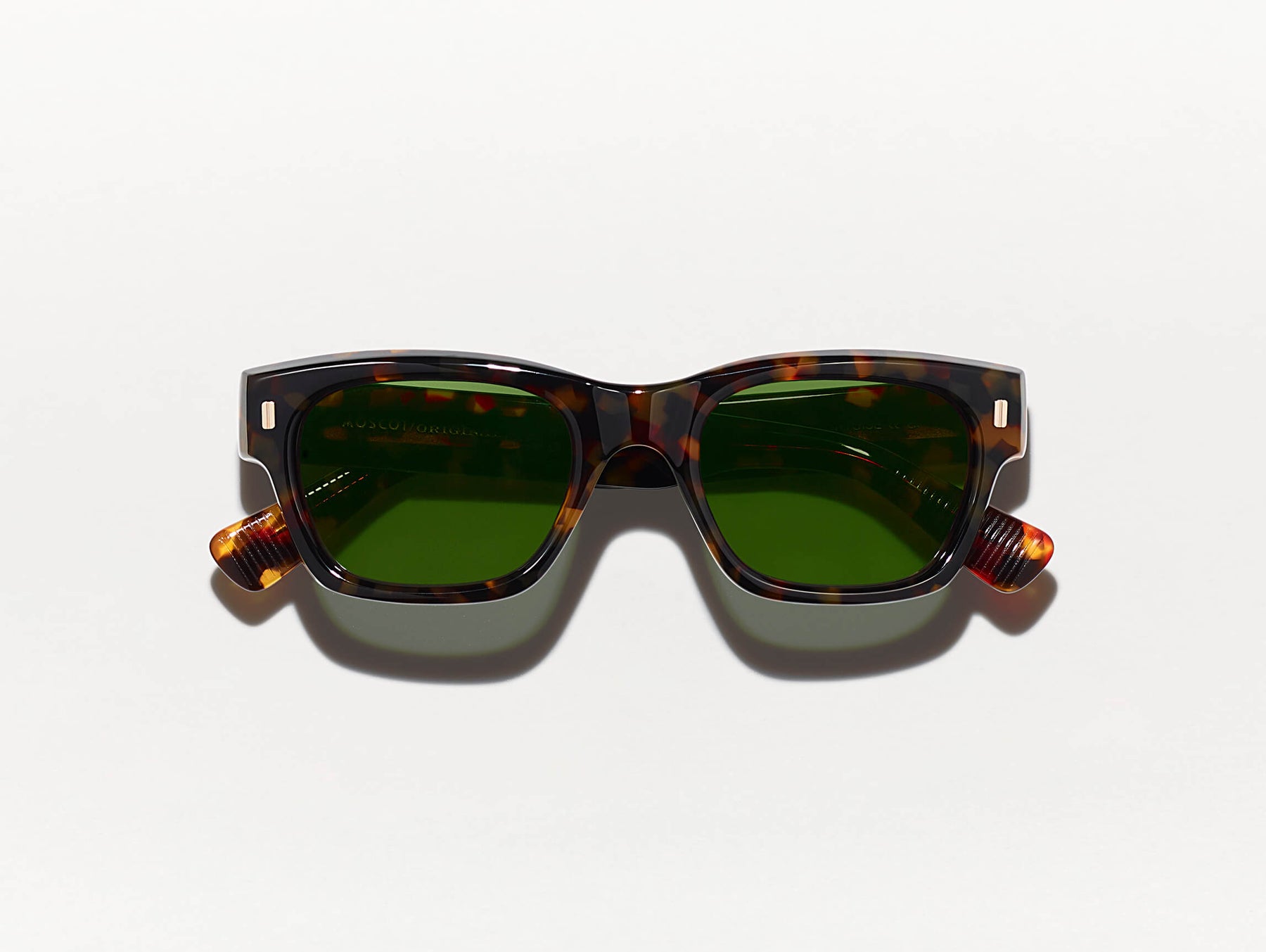 The ZOGAN SUN in Tortoise with CR-39 Green Lenses